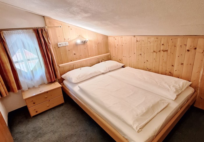 Zweites Schlafzimmer in der Dachschräge